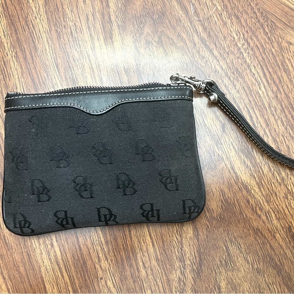 Never used Dooney & Bourke black wristlet